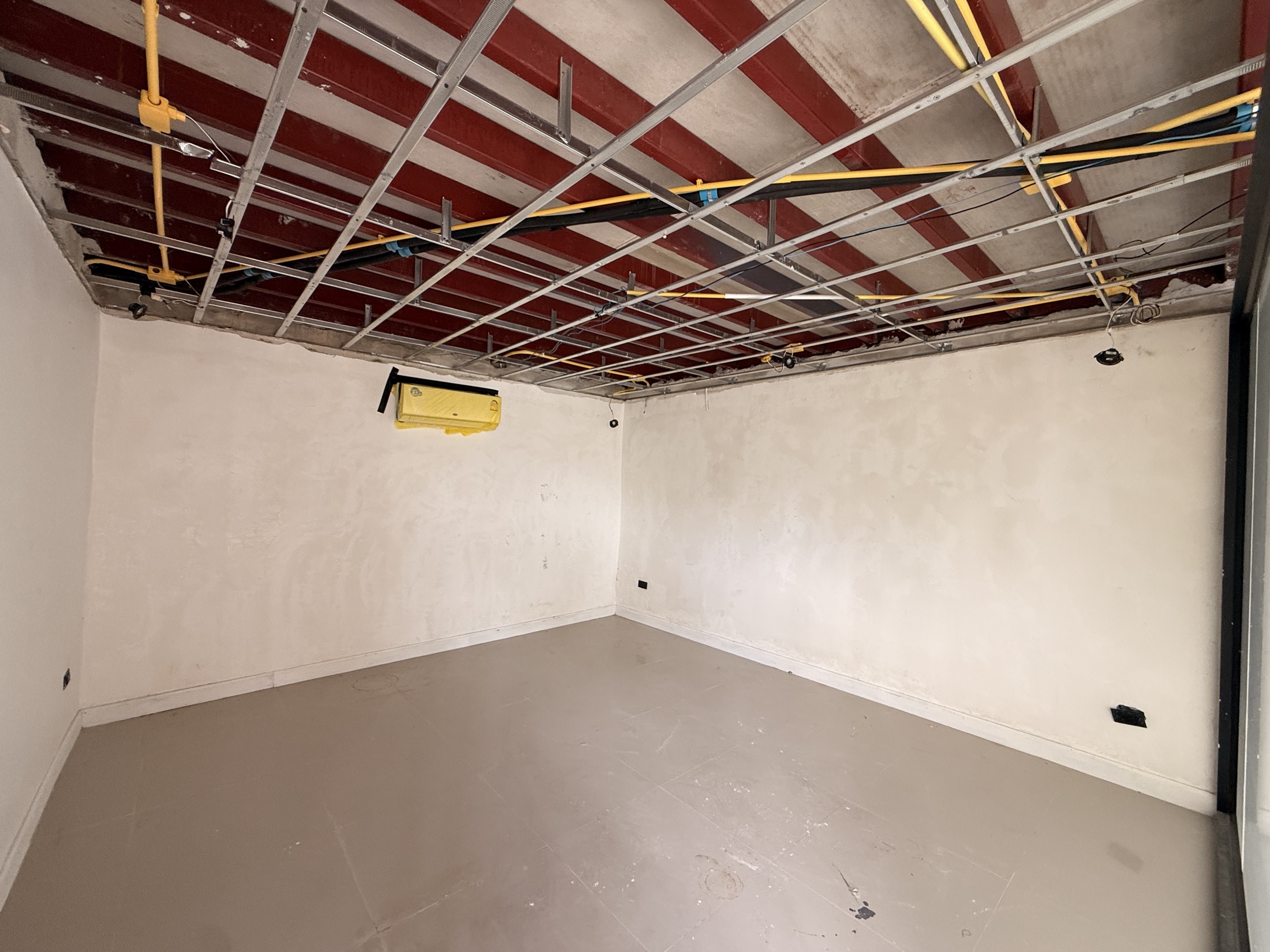 Gym / former Backroom after the ceiling and room clear-out